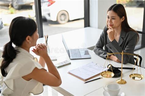 Lesbian Lawyer and her client .